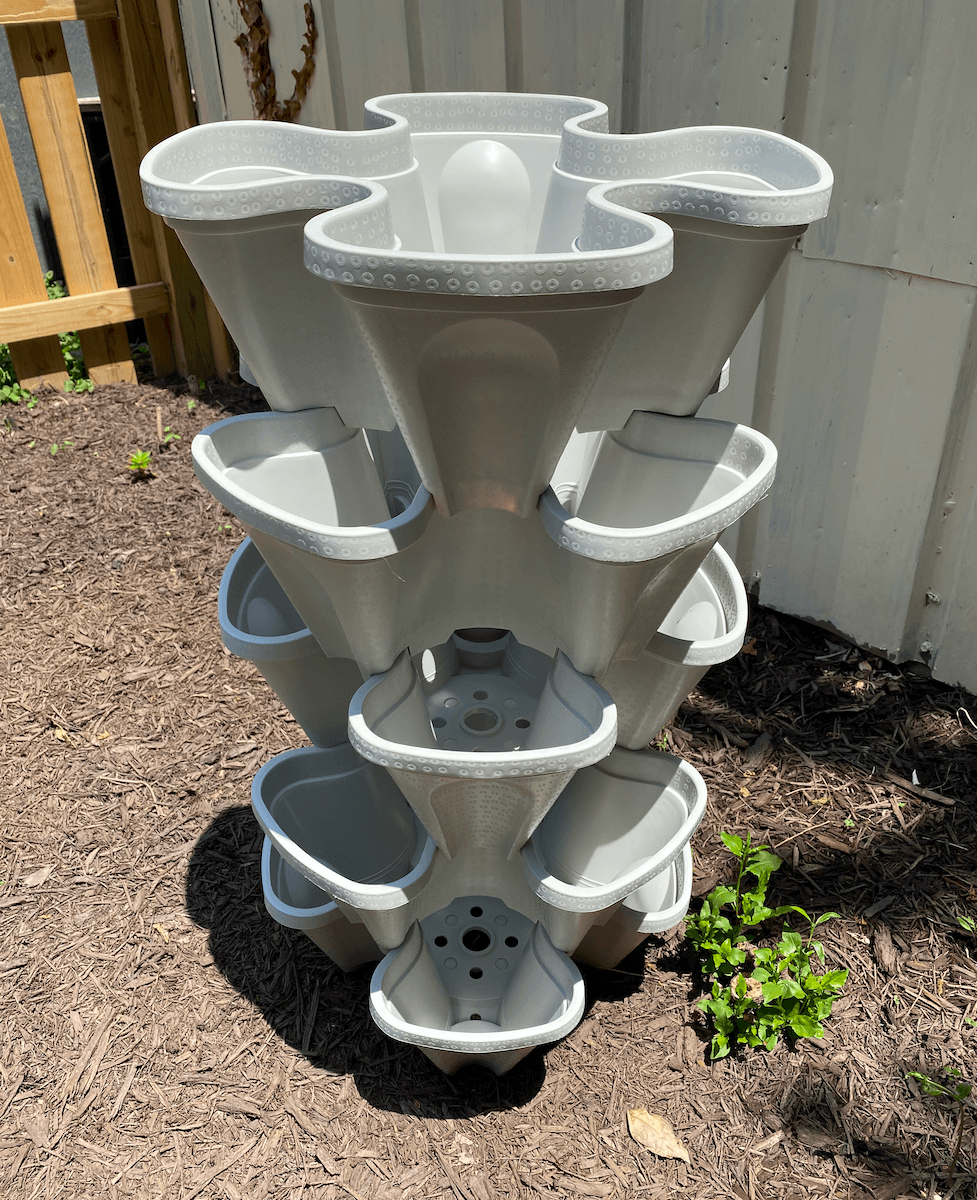 An empty stackable tiered planter